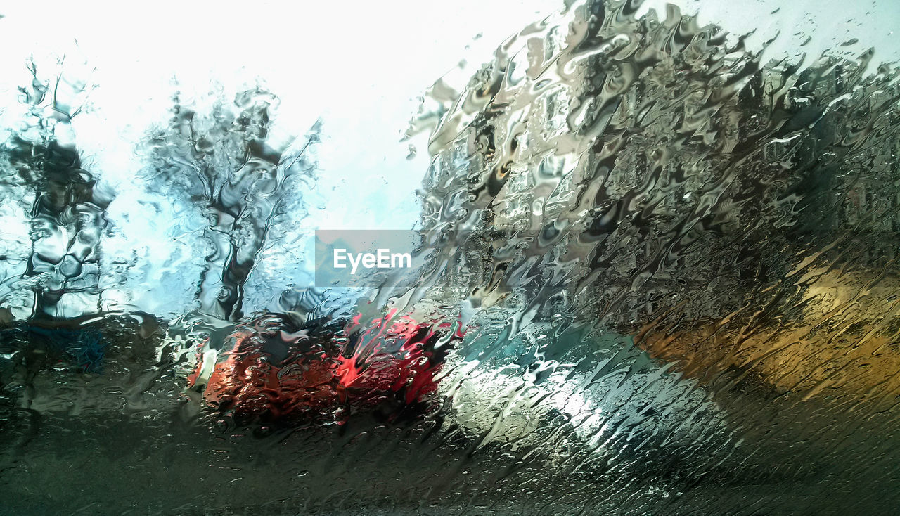 RAINDROPS ON CAR WINDOW