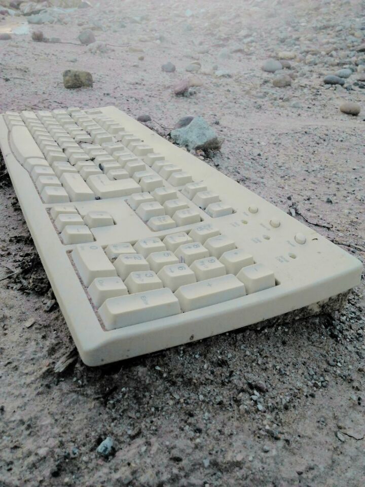 no people, day, high angle view, sand, computer keyboard, outdoors, close-up, chess