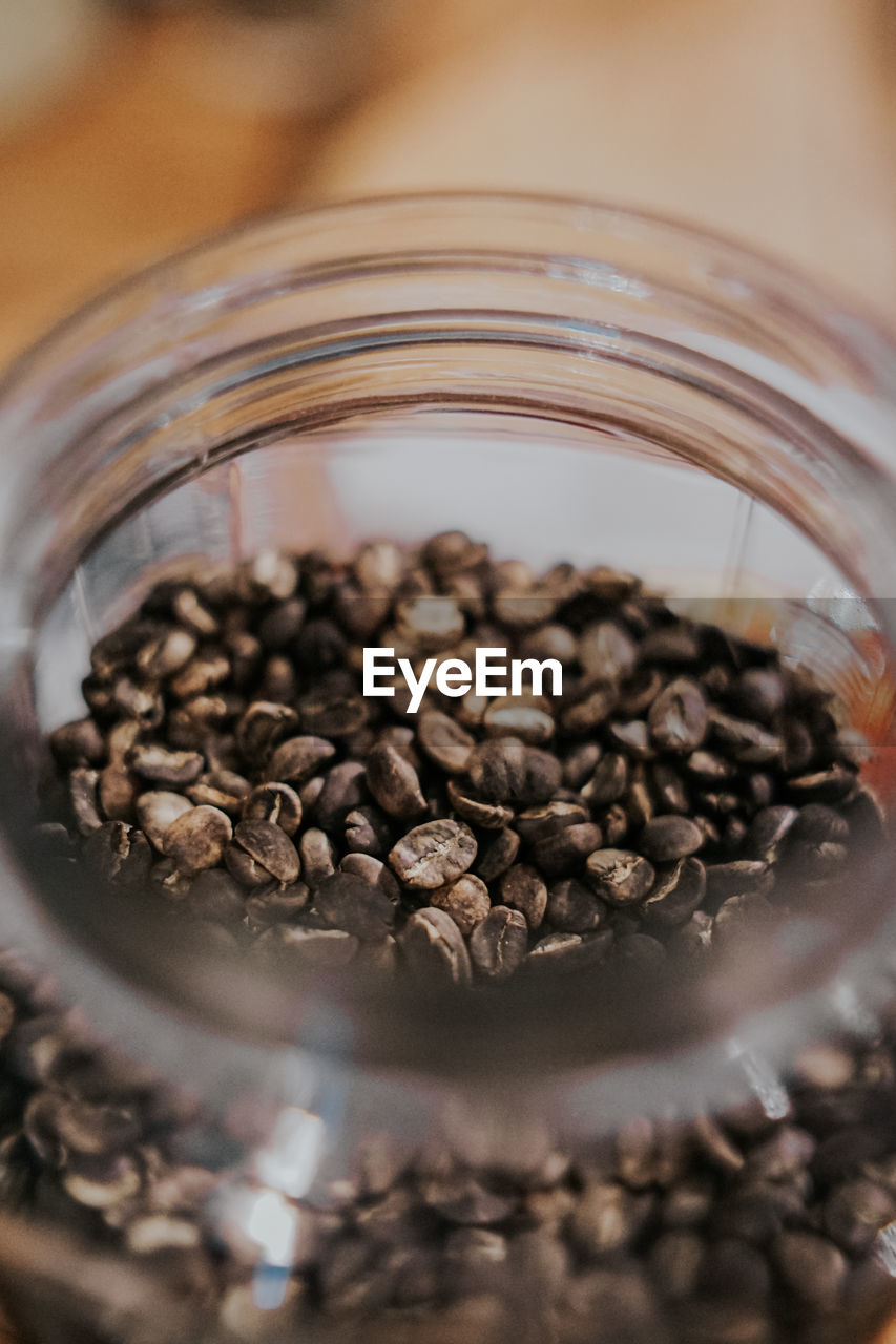 Close-up of coffee beans in glass