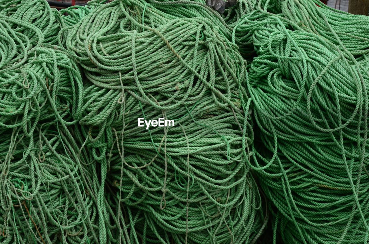 FULL FRAME SHOT OF FISHING NETS