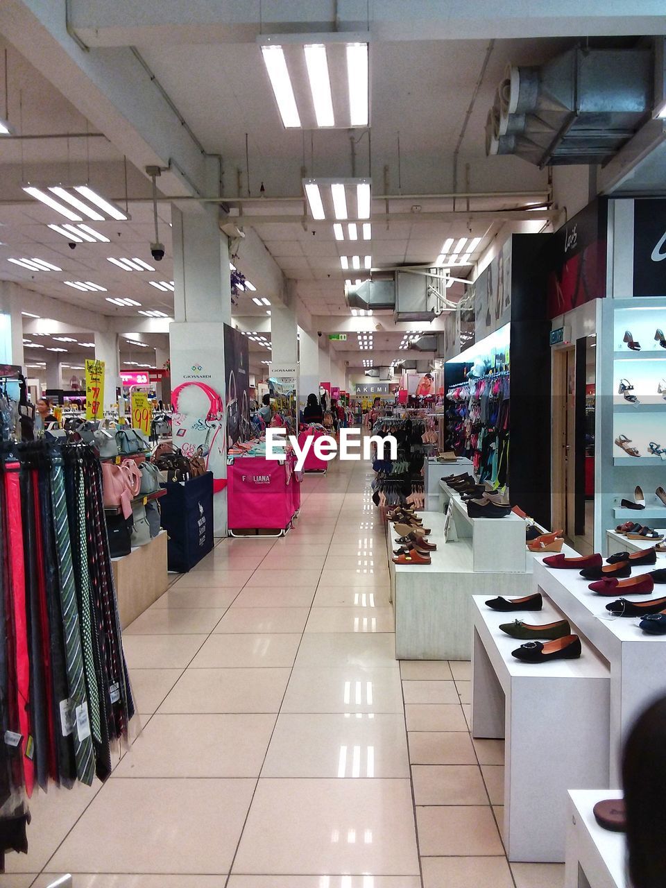PEOPLE IN SHOPPING MALL AT MARKET