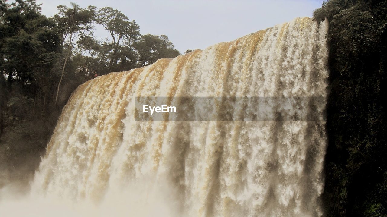 Low angle view of waterfall