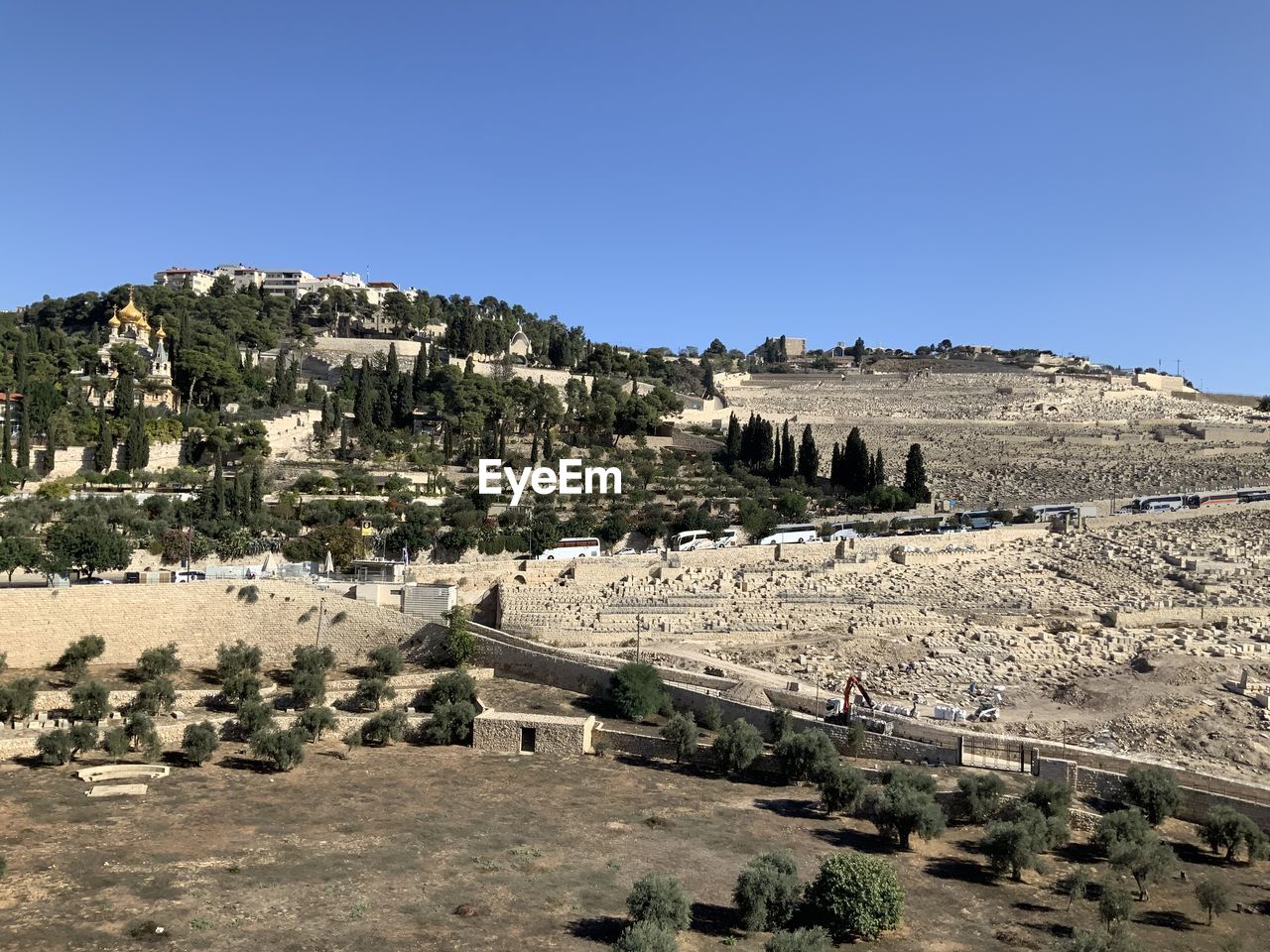 Panoramic view of ancient buildings against clear blue sky in jerusalem