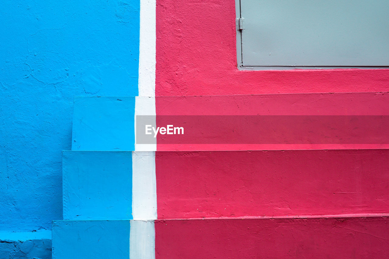 Full frame shot of blue and pink painted steps