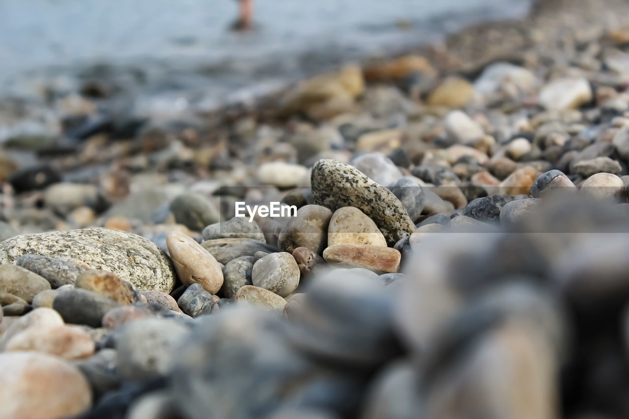 Close-up of stones on beach