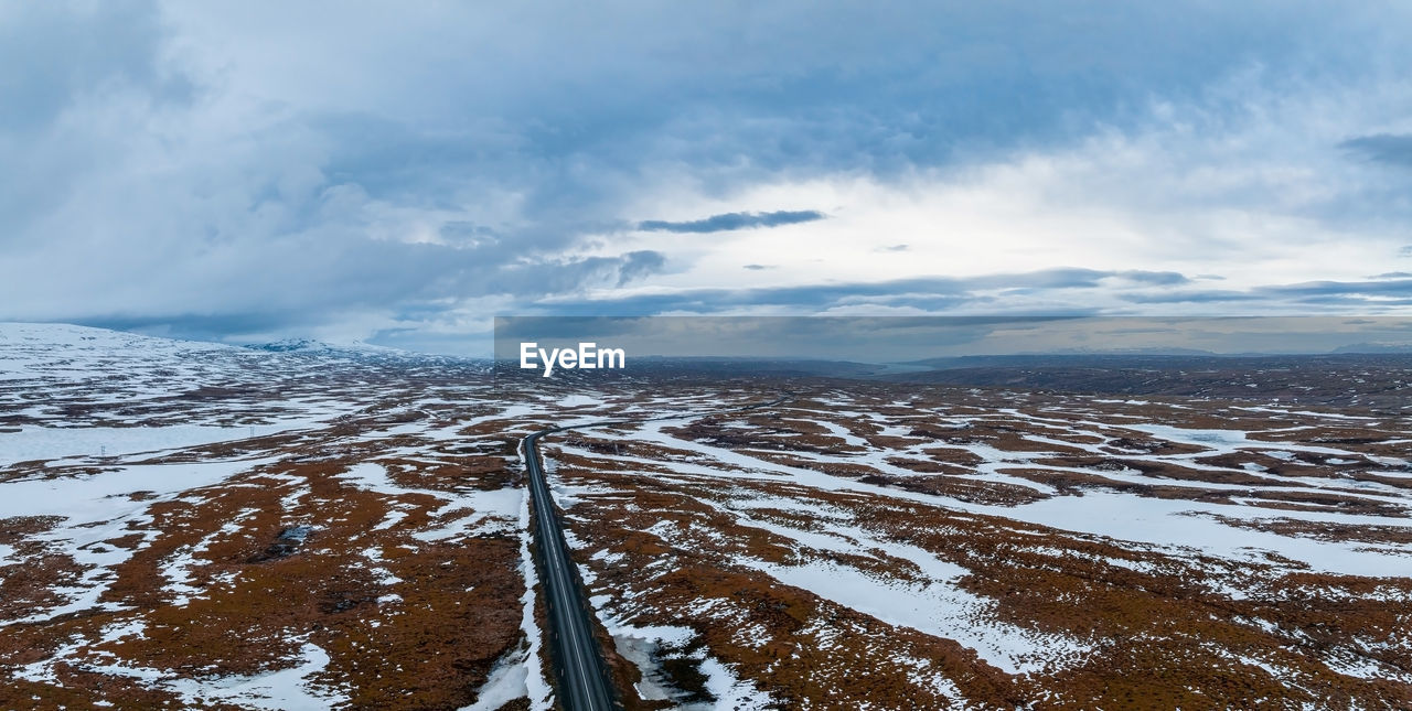 Aerial video of an empty lava fields and huge volcanic mountain in iceland