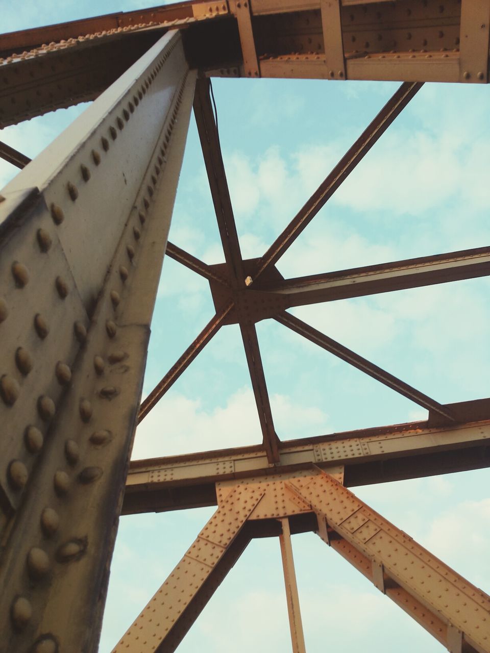 Low angle view of metal bridge against sky in moravski park