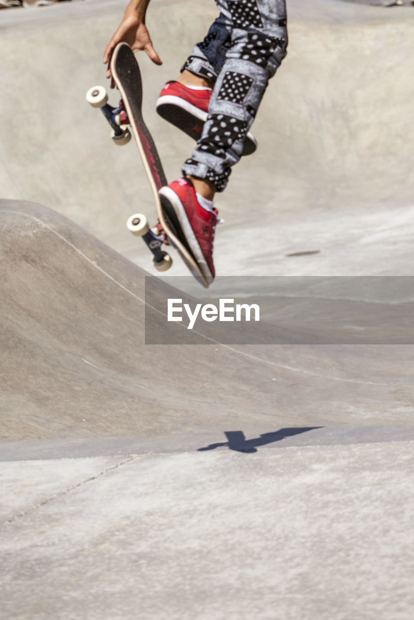 BLURRED MOTION OF PERSON CLIMBING