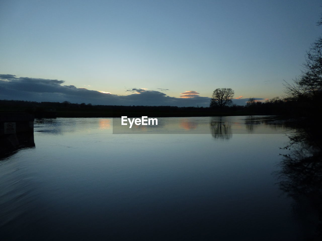 LAKE AGAINST SKY DURING SUNSET