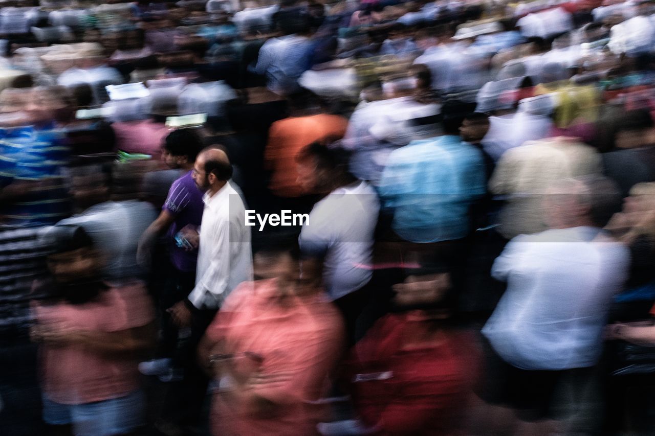 PEOPLE WALKING ON STREET