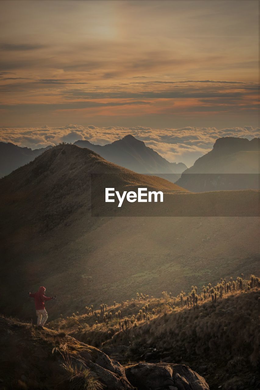 SCENIC VIEW OF MOUNTAINS DURING SUNSET