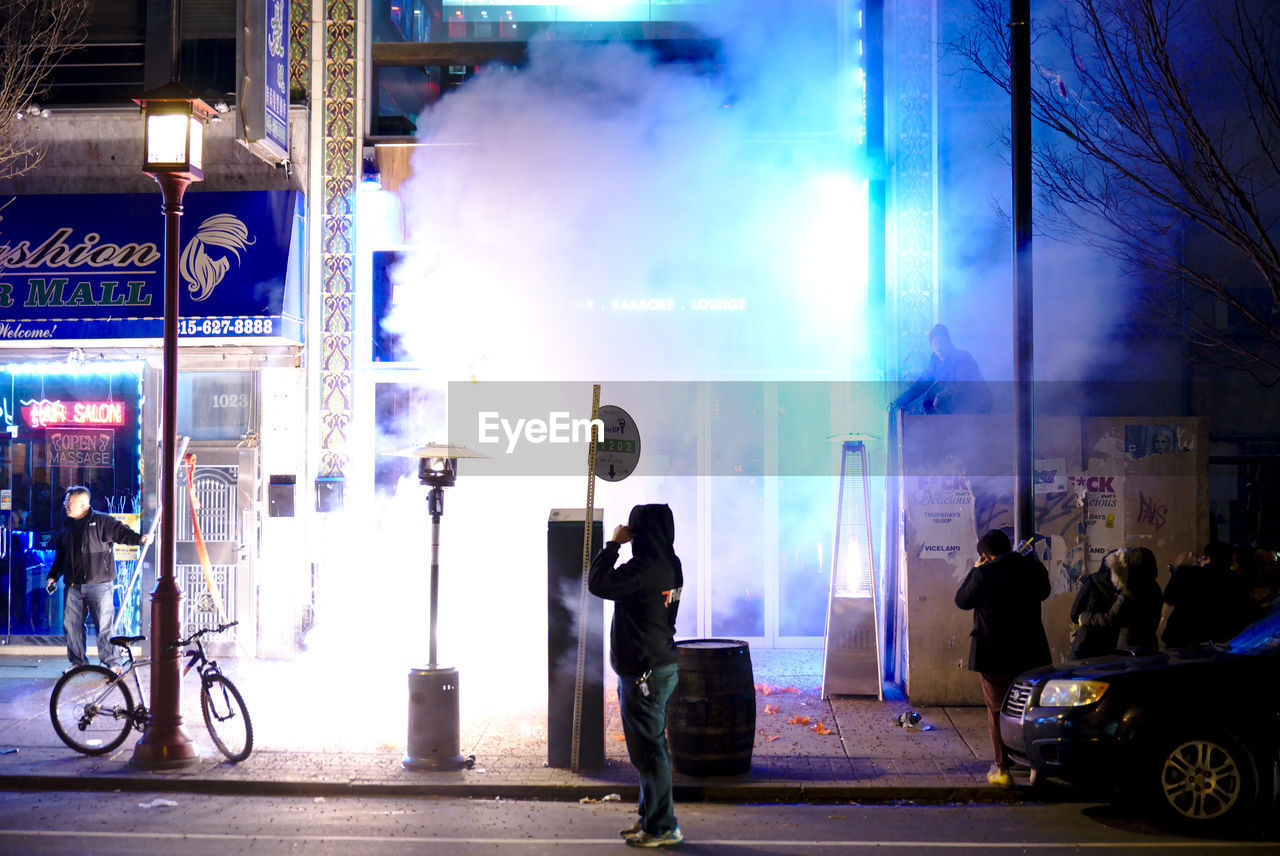 MAN ON STREET IN CITY