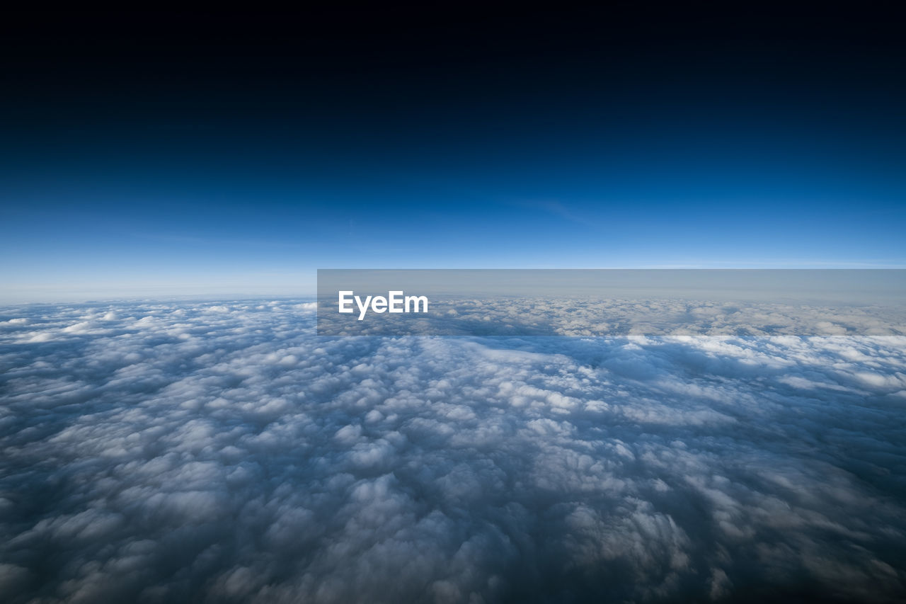 AERIAL VIEW OF CLOUDSCAPE AGAINST SKY