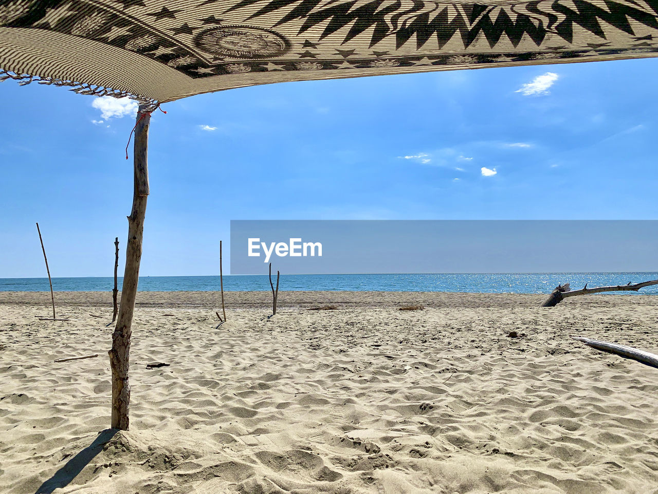 VIEW OF BEACH AGAINST SKY