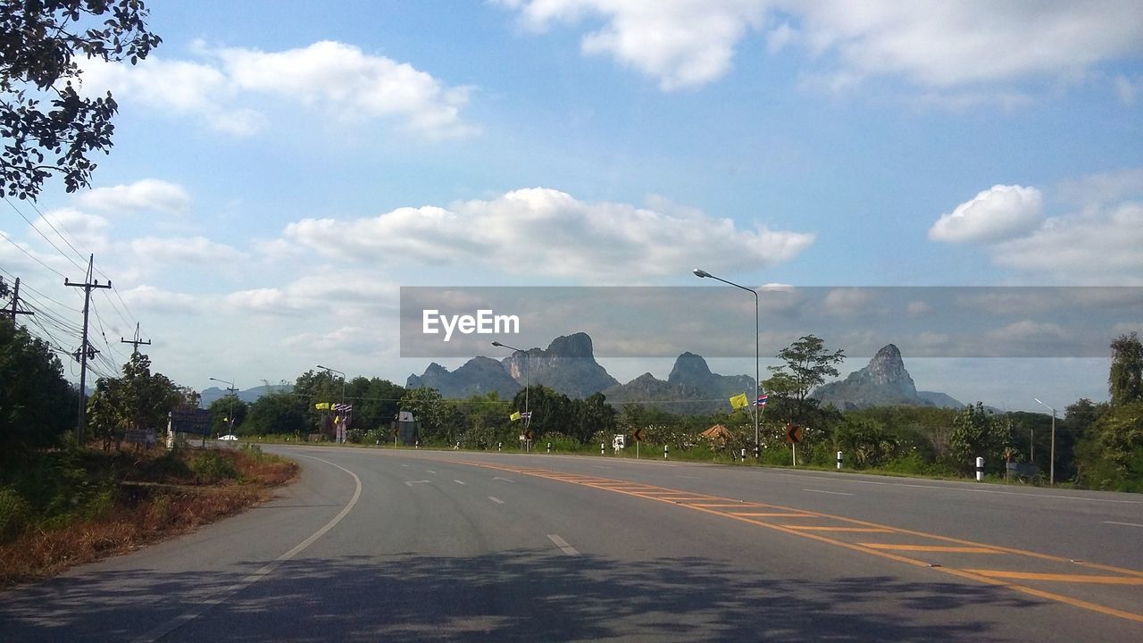 ROAD PASSING THROUGH LANDSCAPE