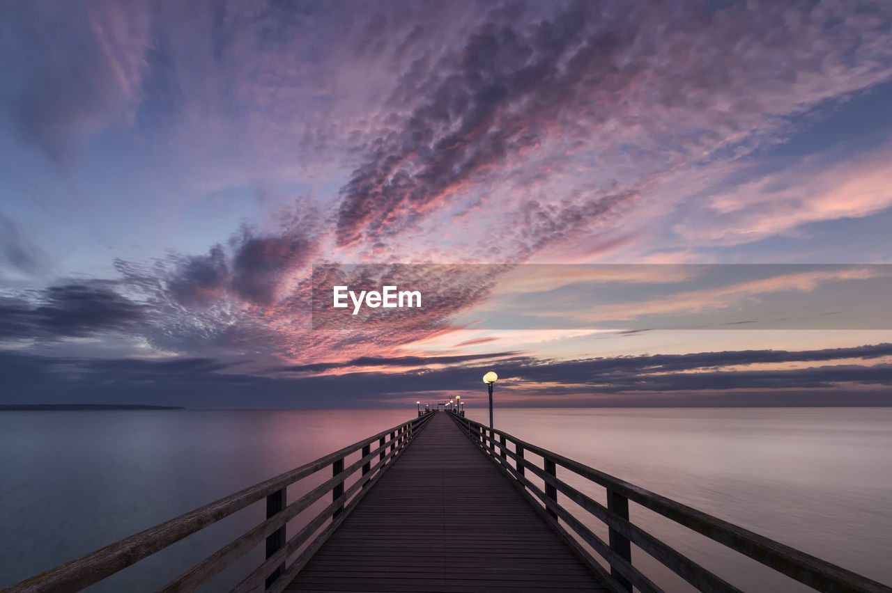 Scenic view of sea against sky at sunset