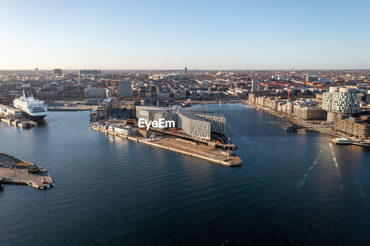 high angle view of boats in sea against clear sky