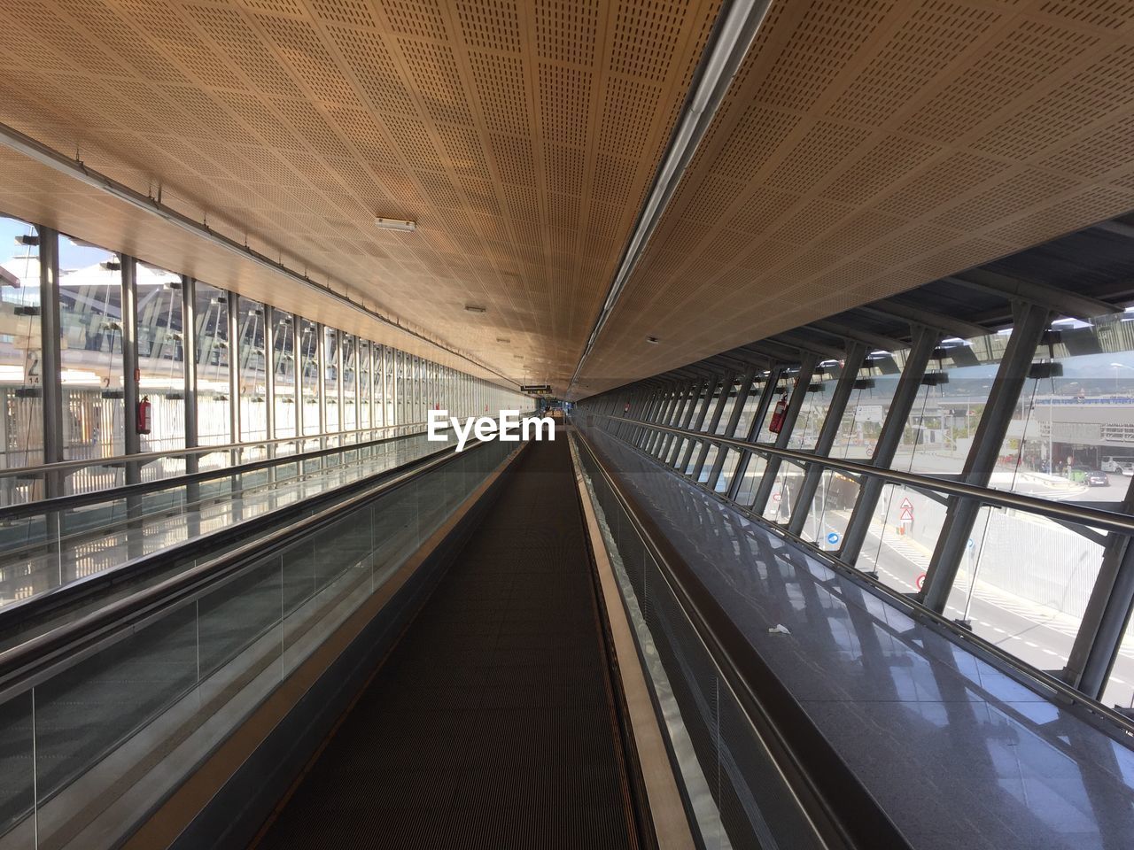 Empty moving walkway in modern building