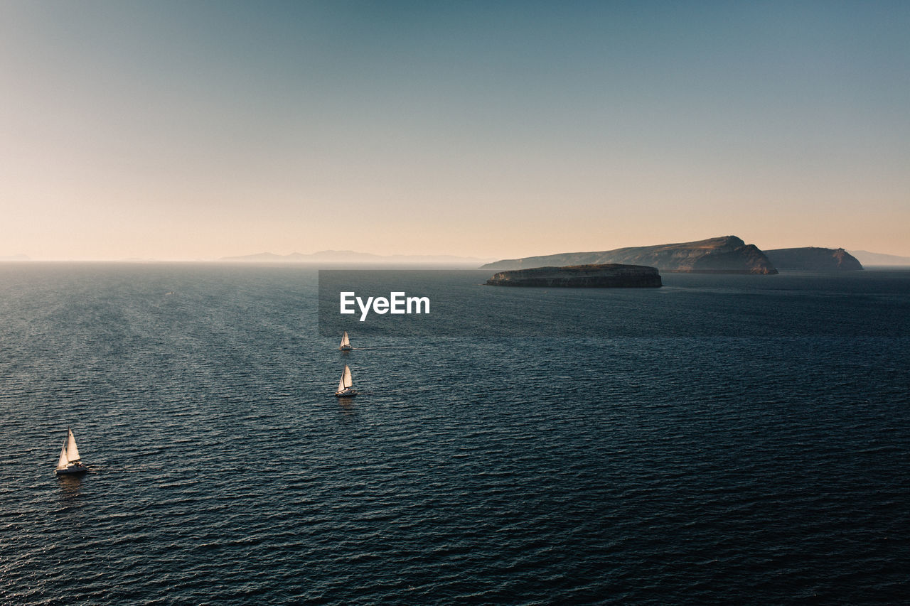 Scenic view of sea against clear sky