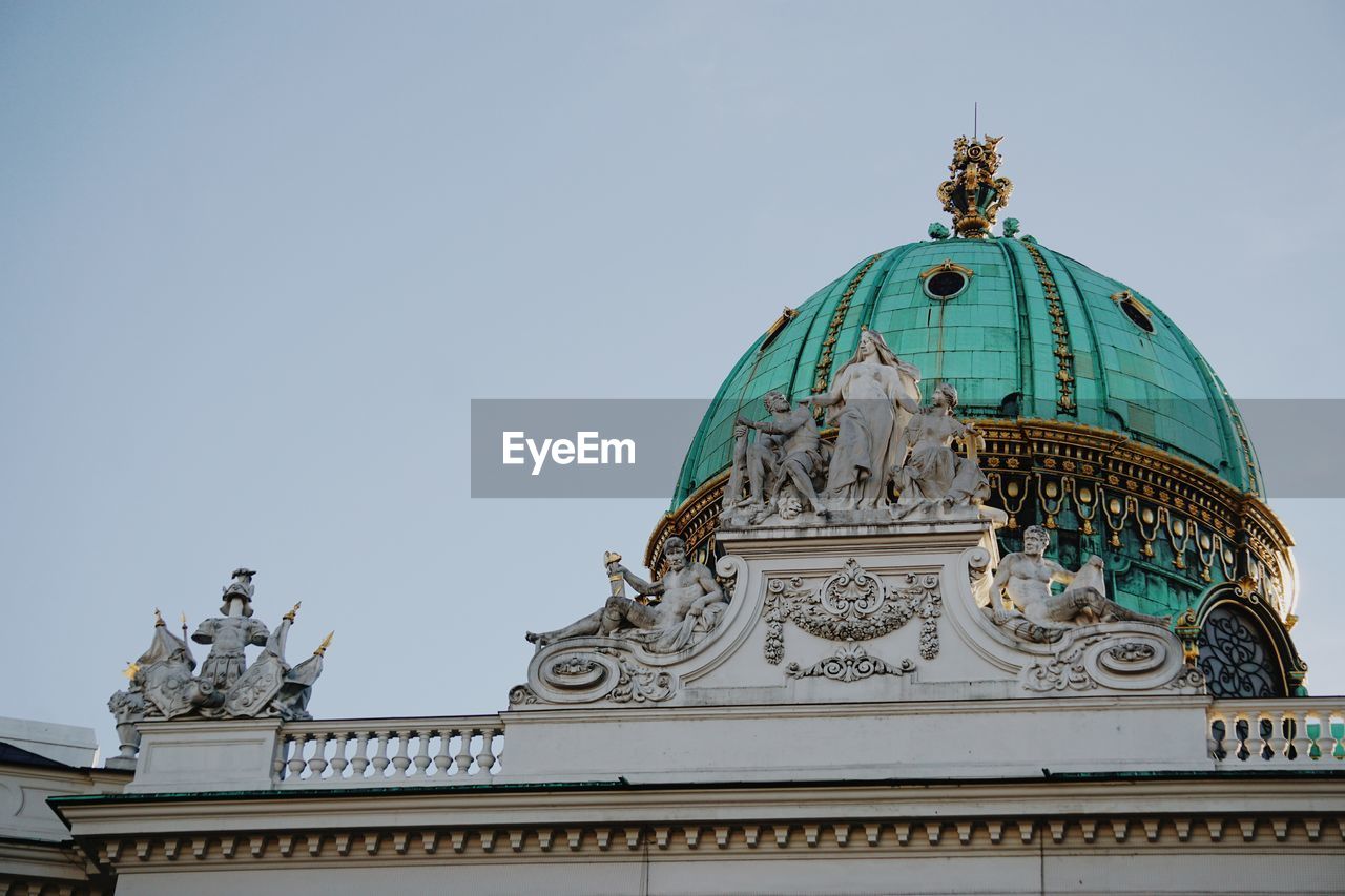 Low angle view of hofburg against clear sky