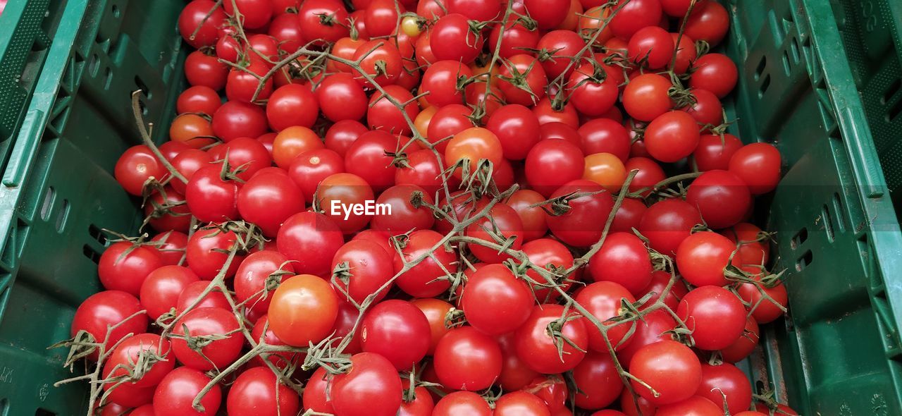 HIGH ANGLE VIEW OF CHERRIES IN MARKET