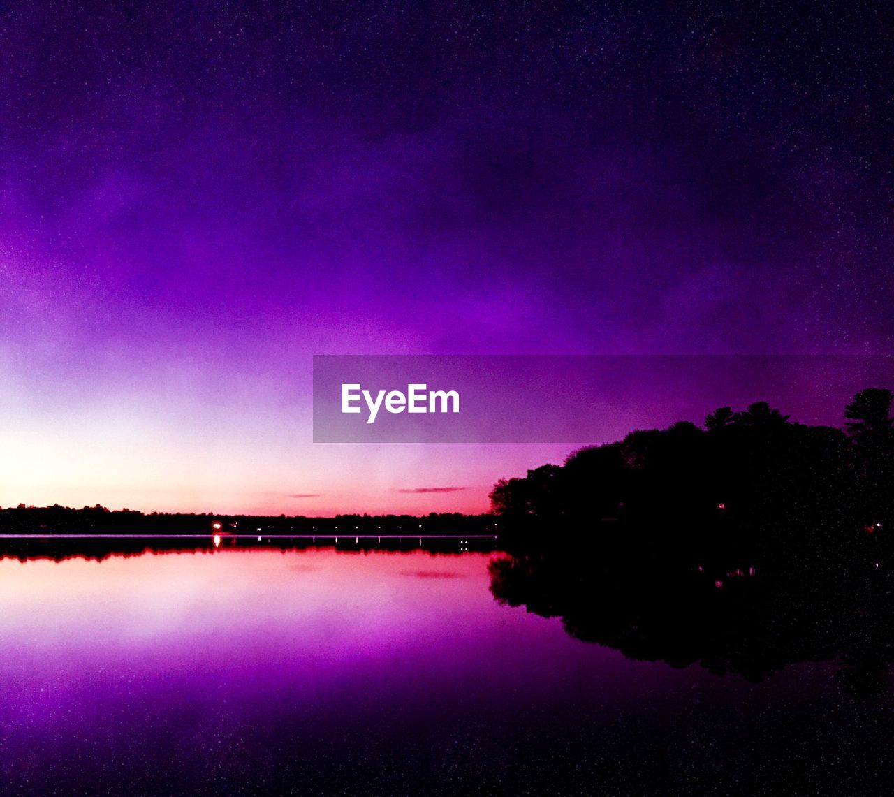 SCENIC VIEW OF LAKE AT NIGHT