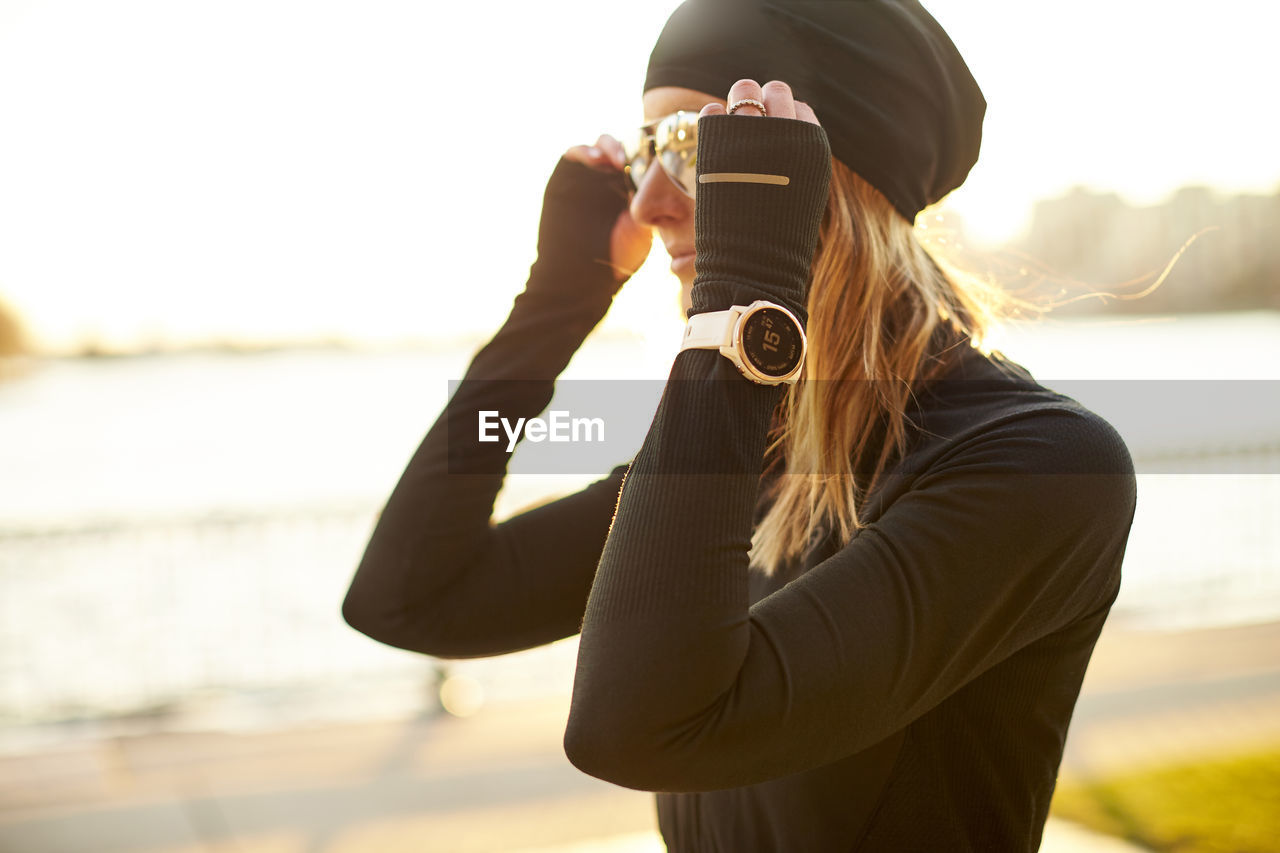 Outdoor portrait of an athletic woman.