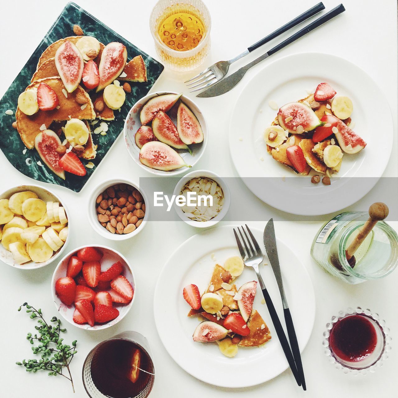 High angle view of various food in plates on table