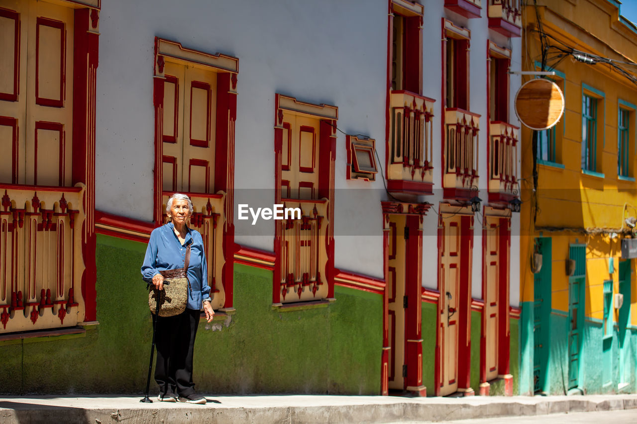 Senior woman tourist at the heritage town of salamina in the department of caldas in colombia