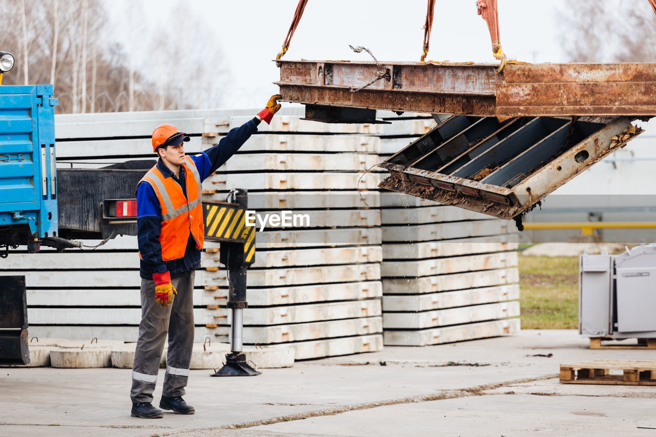 rear view of man standing in front of building