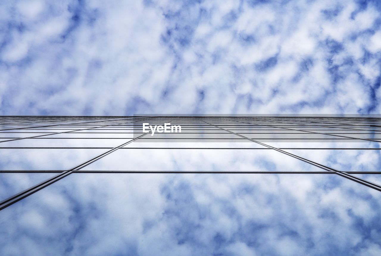 Directly below shot of modern building against sky