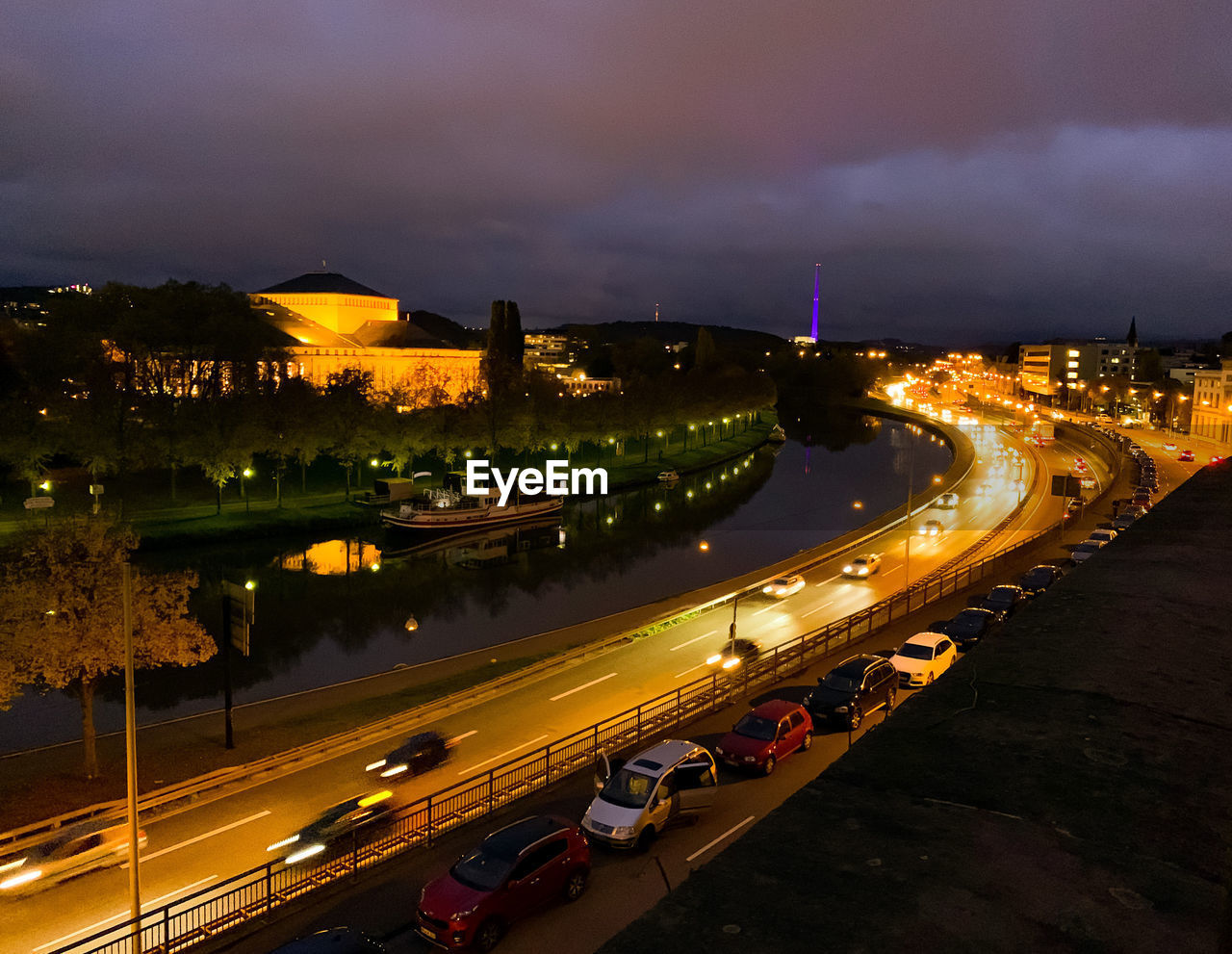 High angle view of light trails on road in city