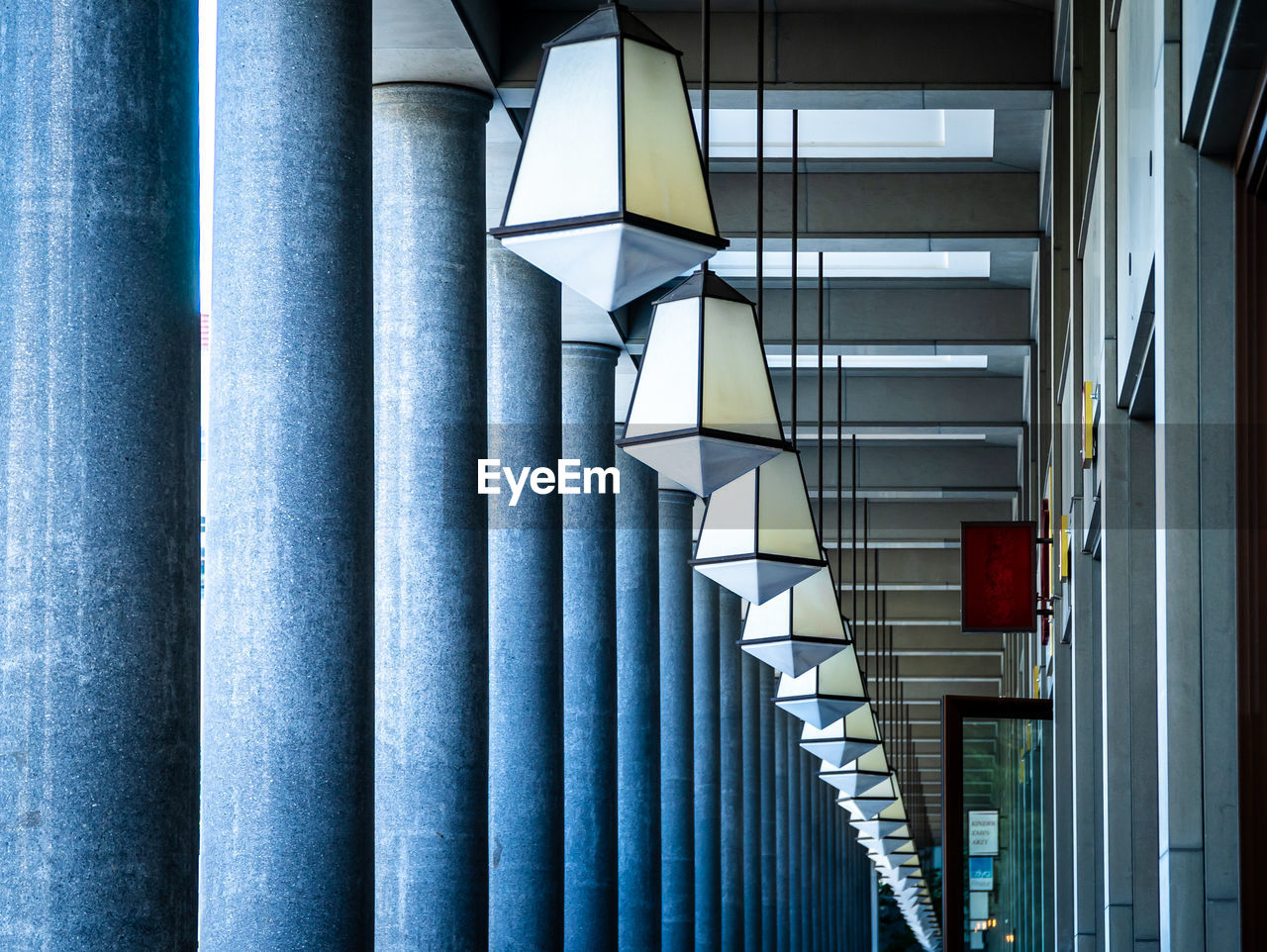 Low angle view of lamps in building