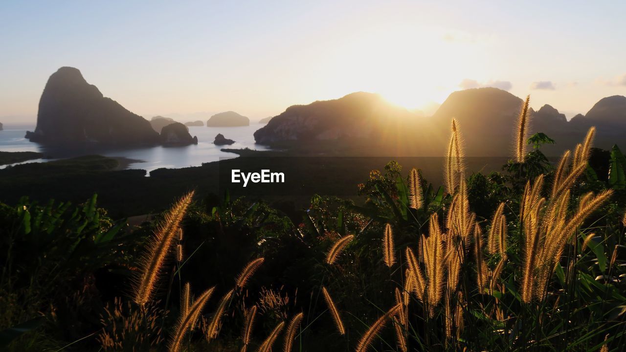 Scenic view of mountains against sky during sunset