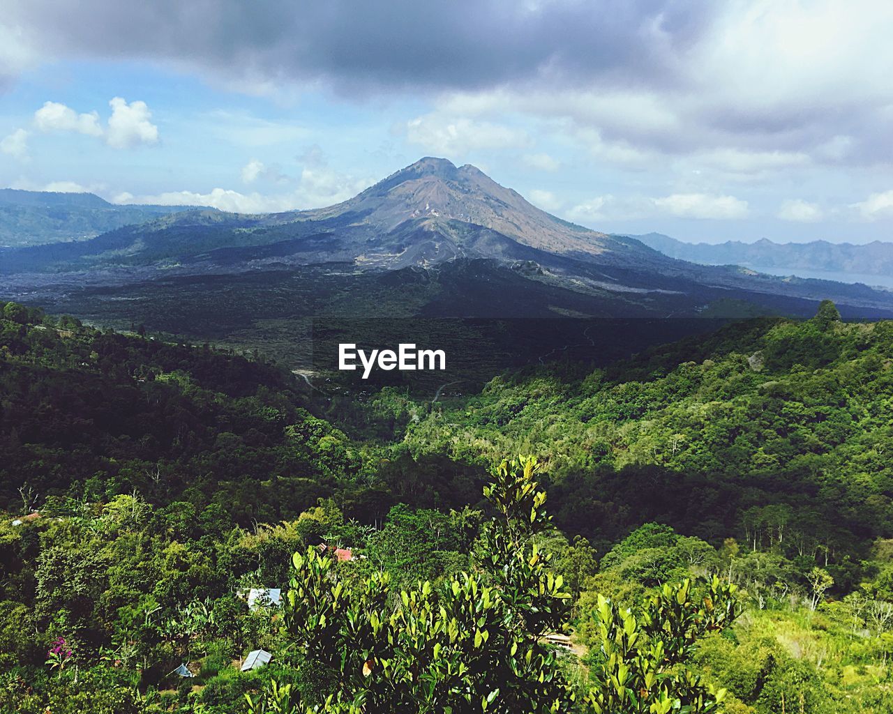 Scenic view of mountains against dramatic sky