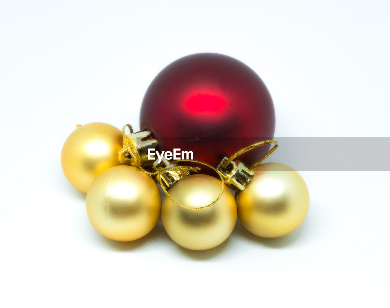 High angle view of christmas balls on white background