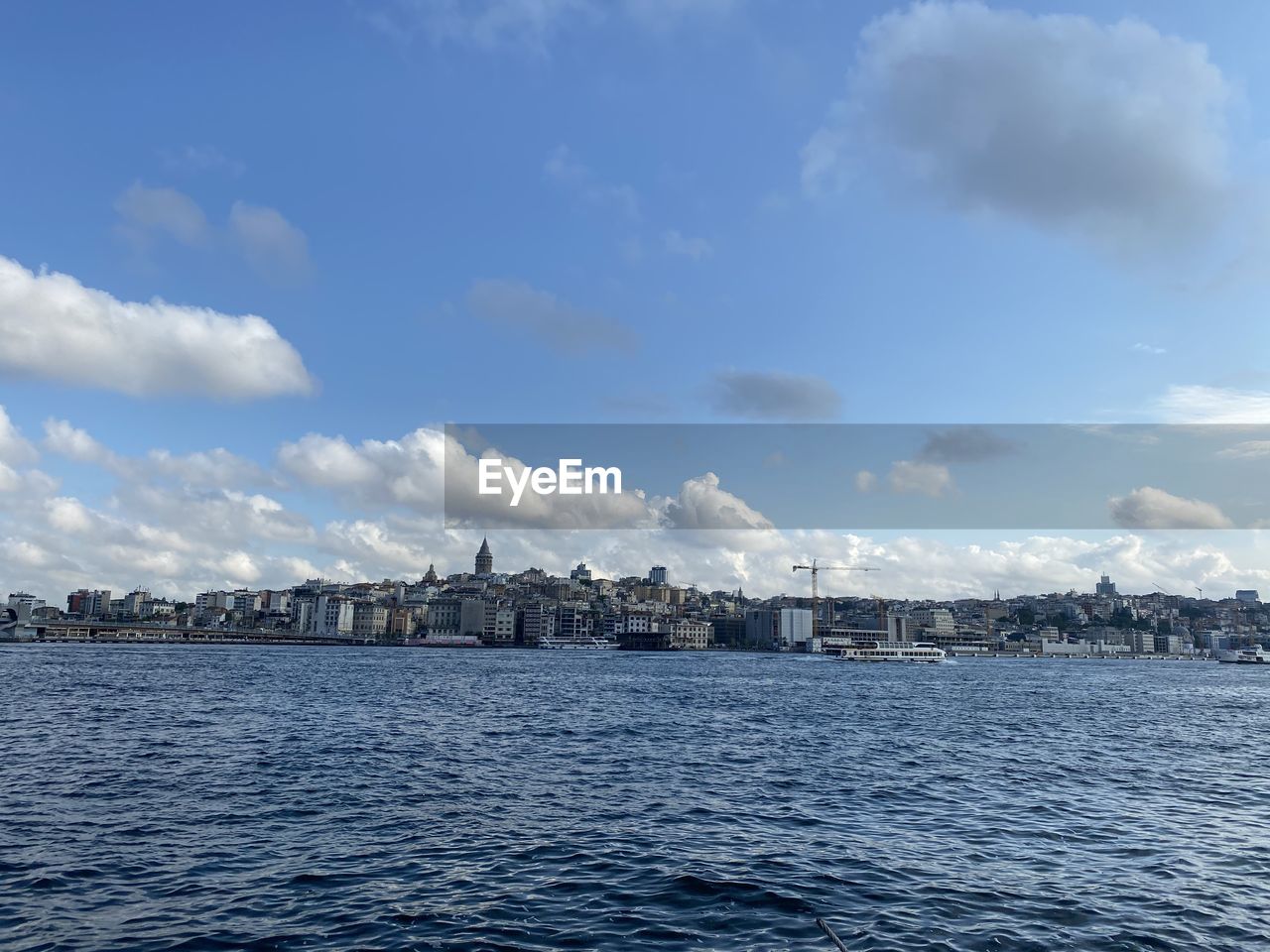 CITY BY SEA AGAINST SKY