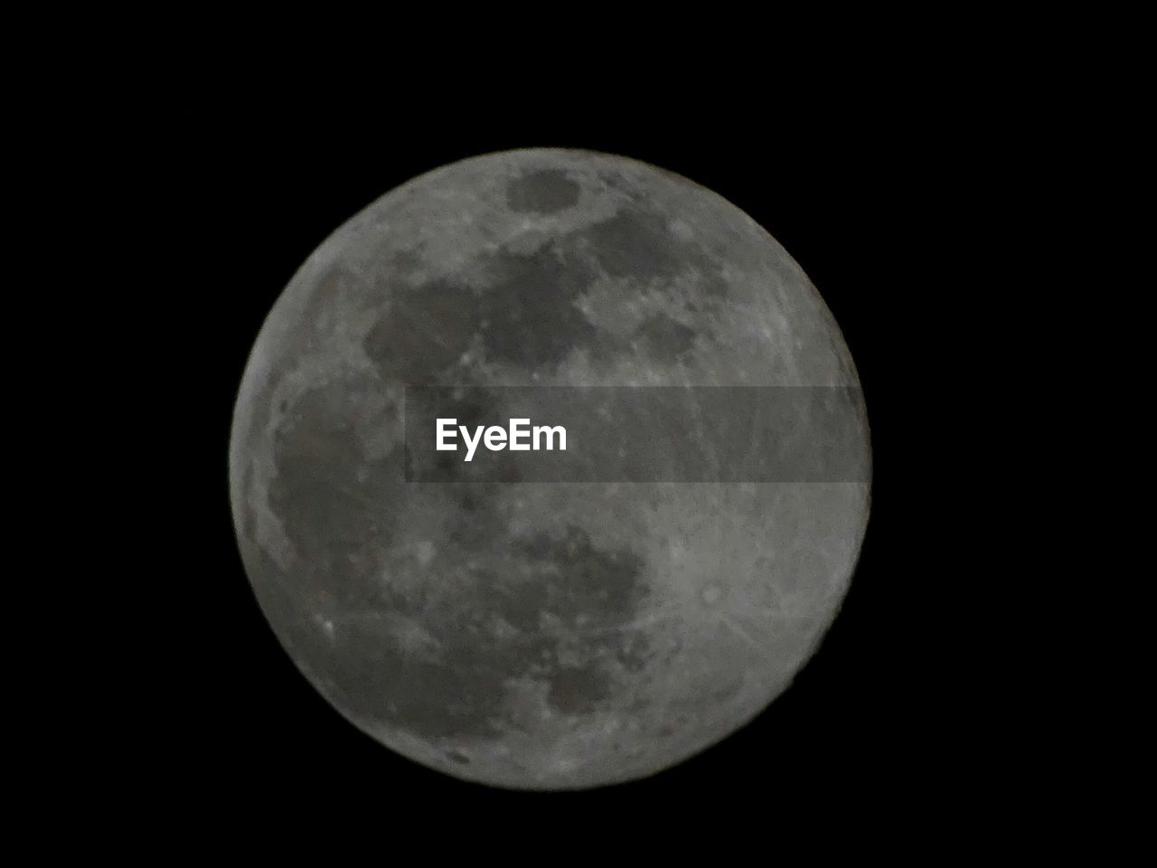 CLOSE-UP OF MOON AGAINST CLEAR SKY