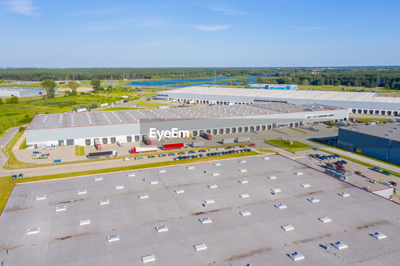 Aerial view of warehouse storages or industrial factory or logistics center from above. aerial 