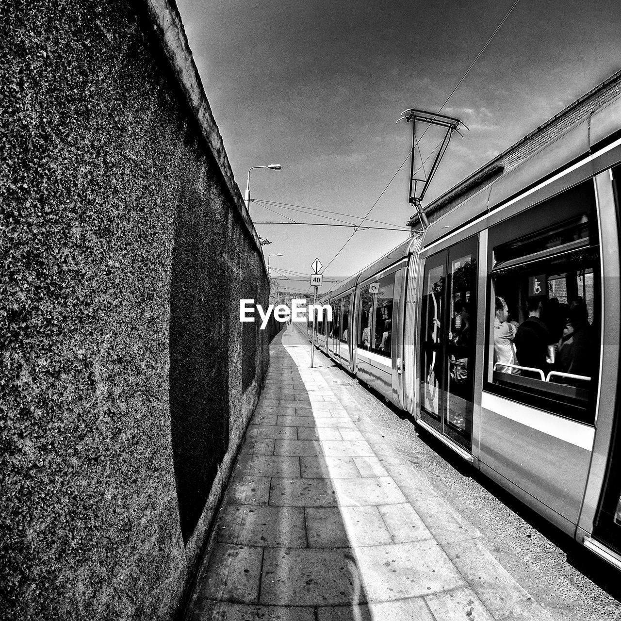 TRAIN ON RAILWAY STATION PLATFORM