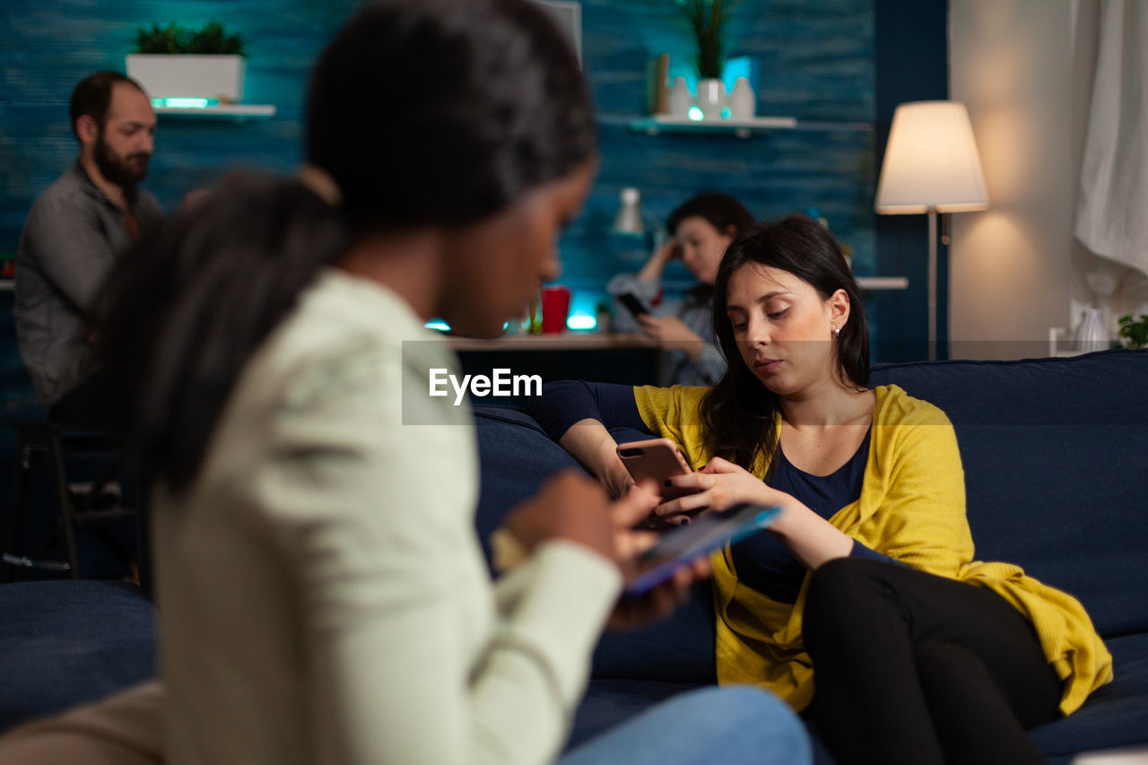 woman using digital tablet