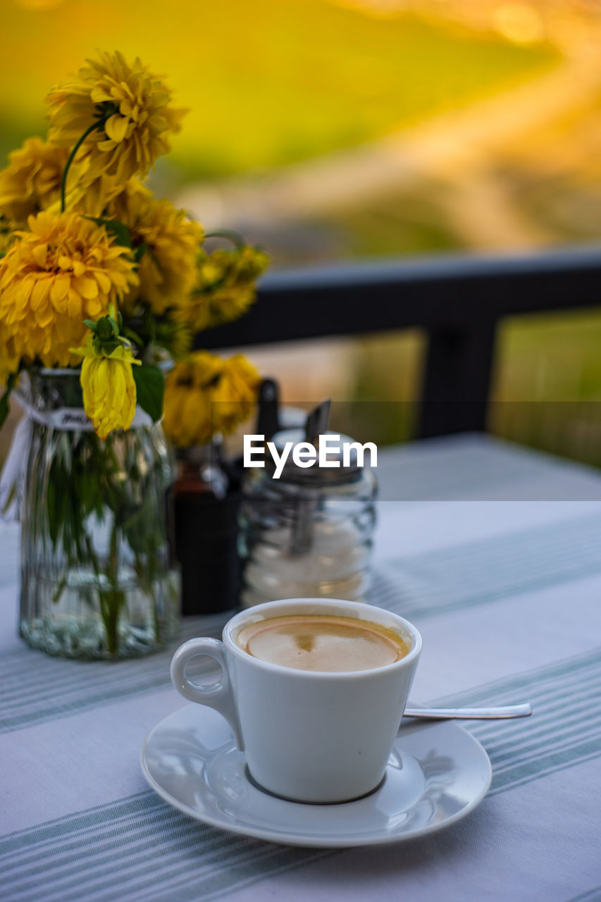 close-up of coffee and drink on table