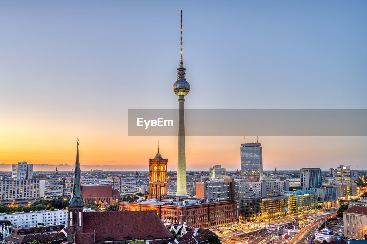 Downtown berlin after sunset with the tv tower and the town hall