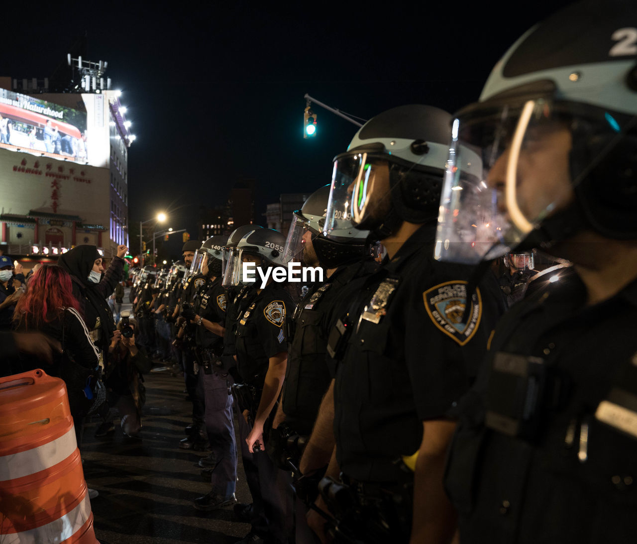 CROWD ON STREET AT NIGHT