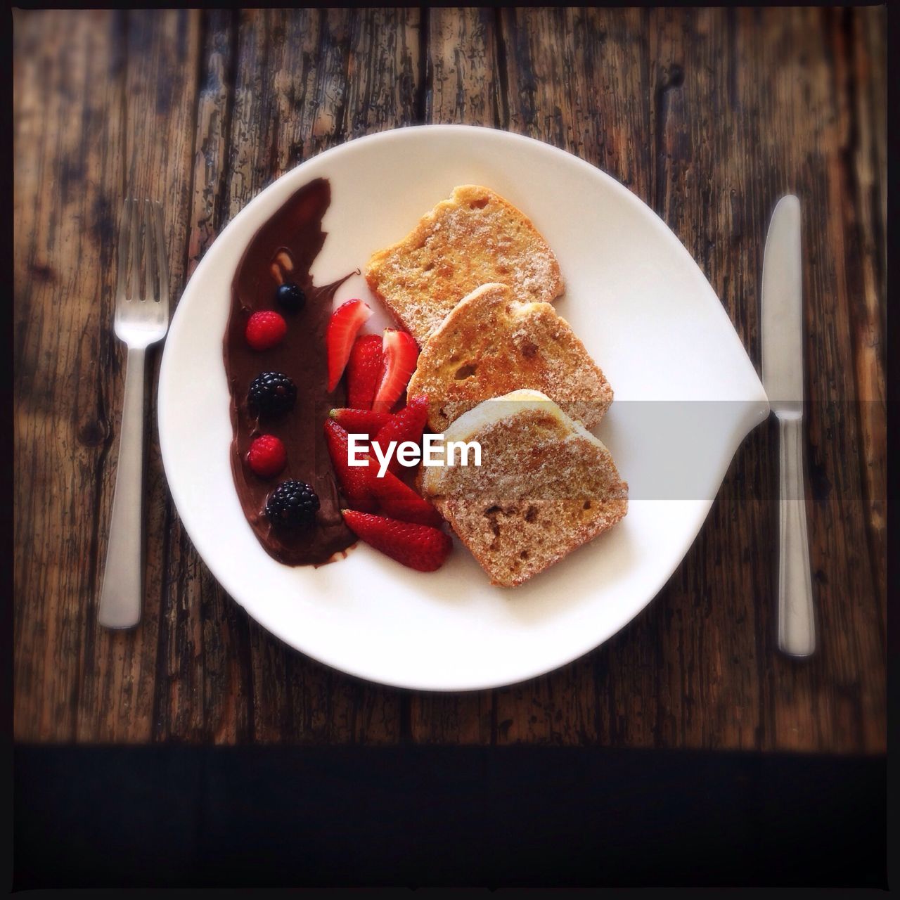 CLOSE-UP OF SERVED FOOD ON TABLE