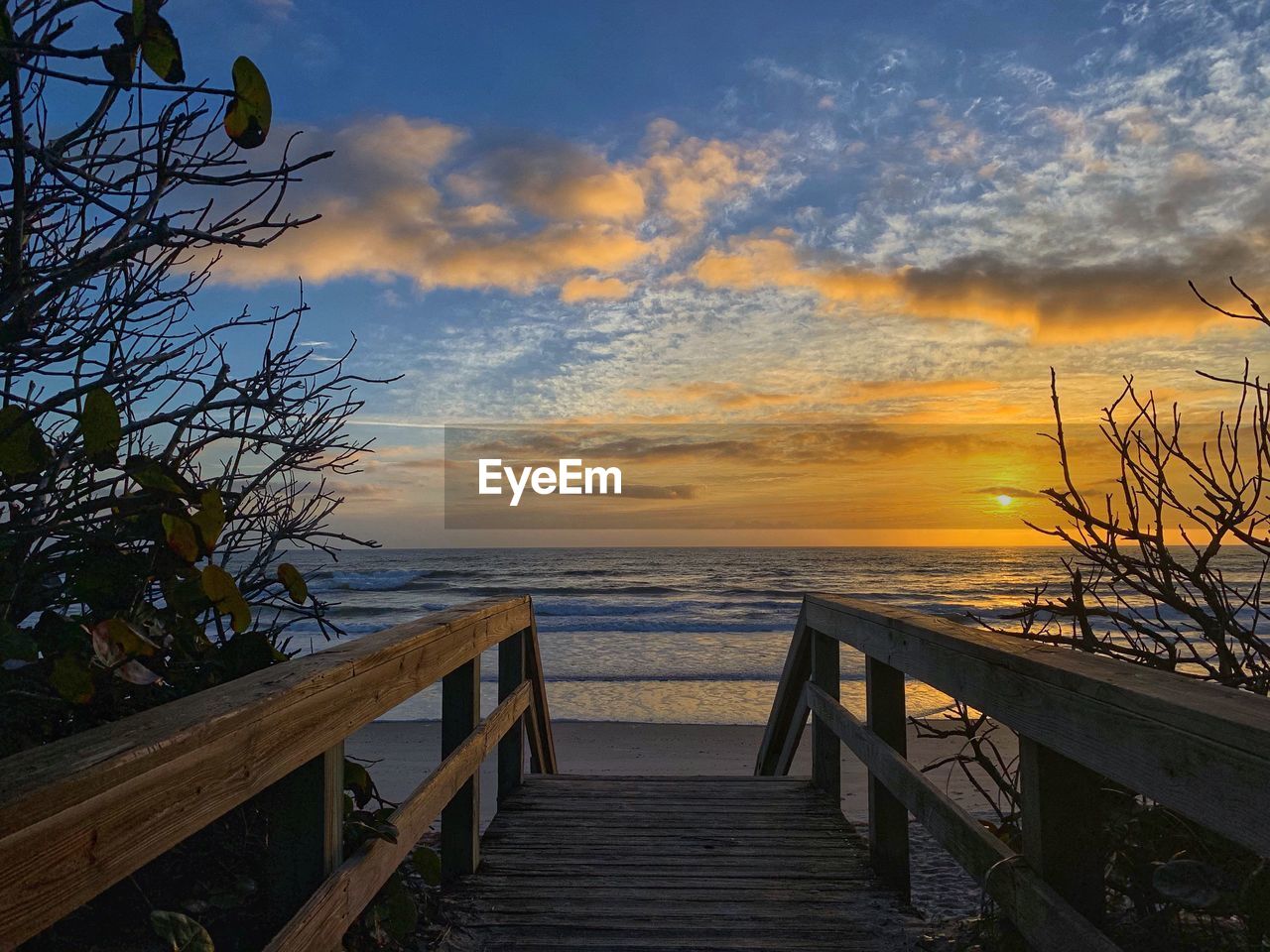 SCENIC VIEW OF SEA DURING SUNSET