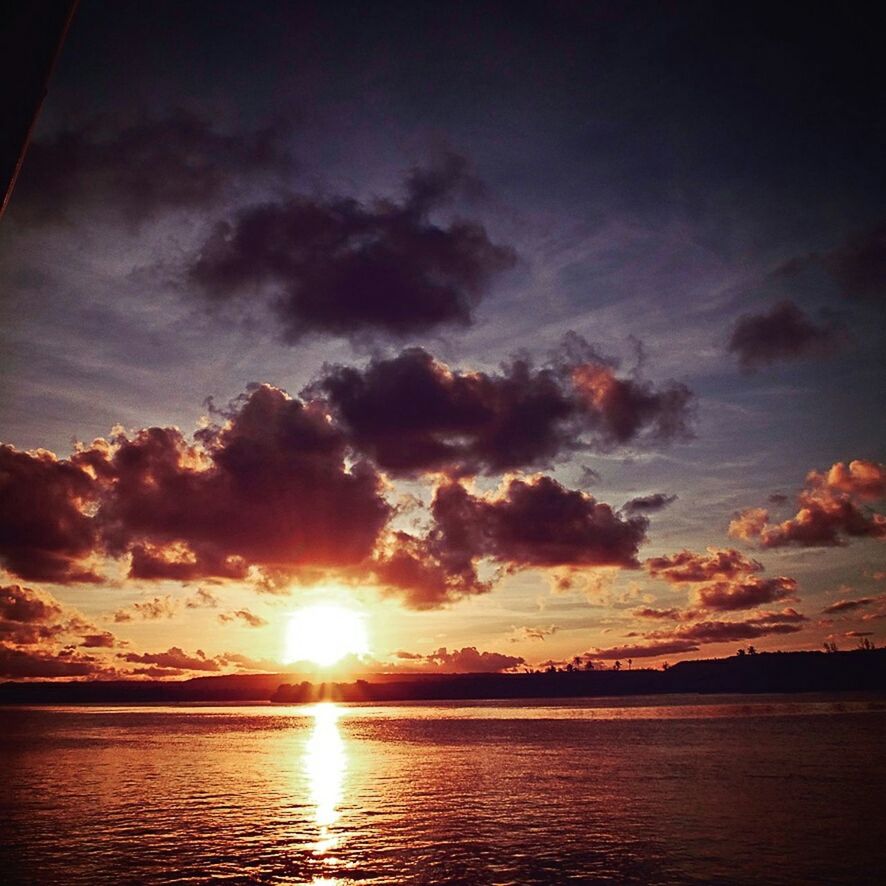SUN SHINING OVER SEA