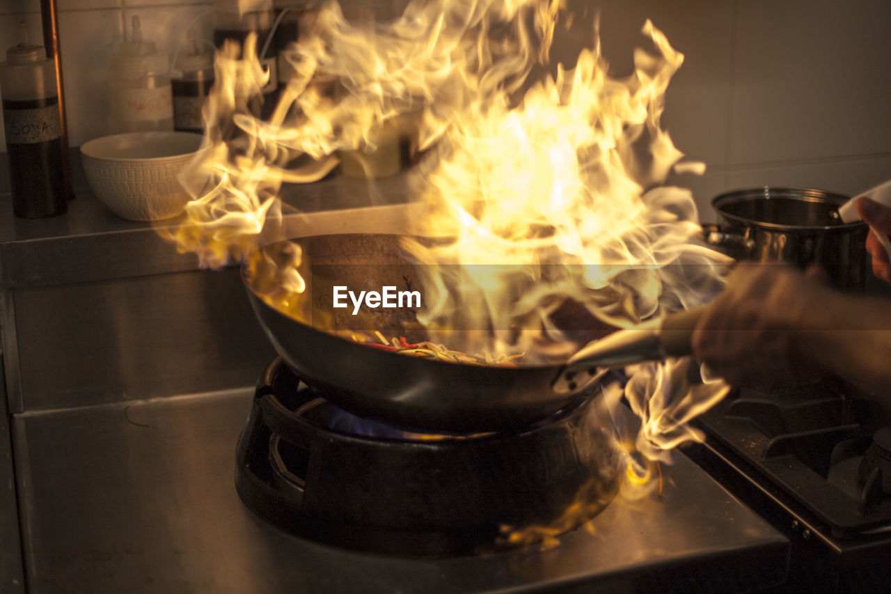 CLOSE-UP OF FIRE IN COOKING
