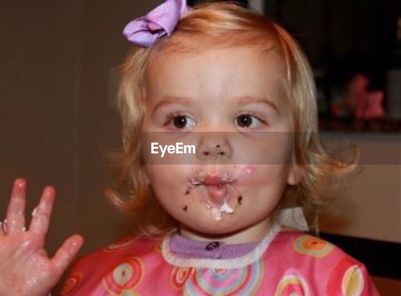 CLOSE-UP PORTRAIT OF CUTE GIRL WITH EYES CLOSED