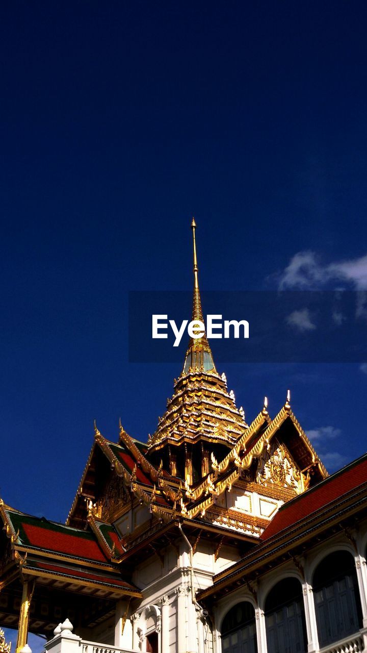 Low angle view of grand palace against sky